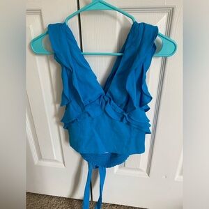 Size medium cropped tank top in blue